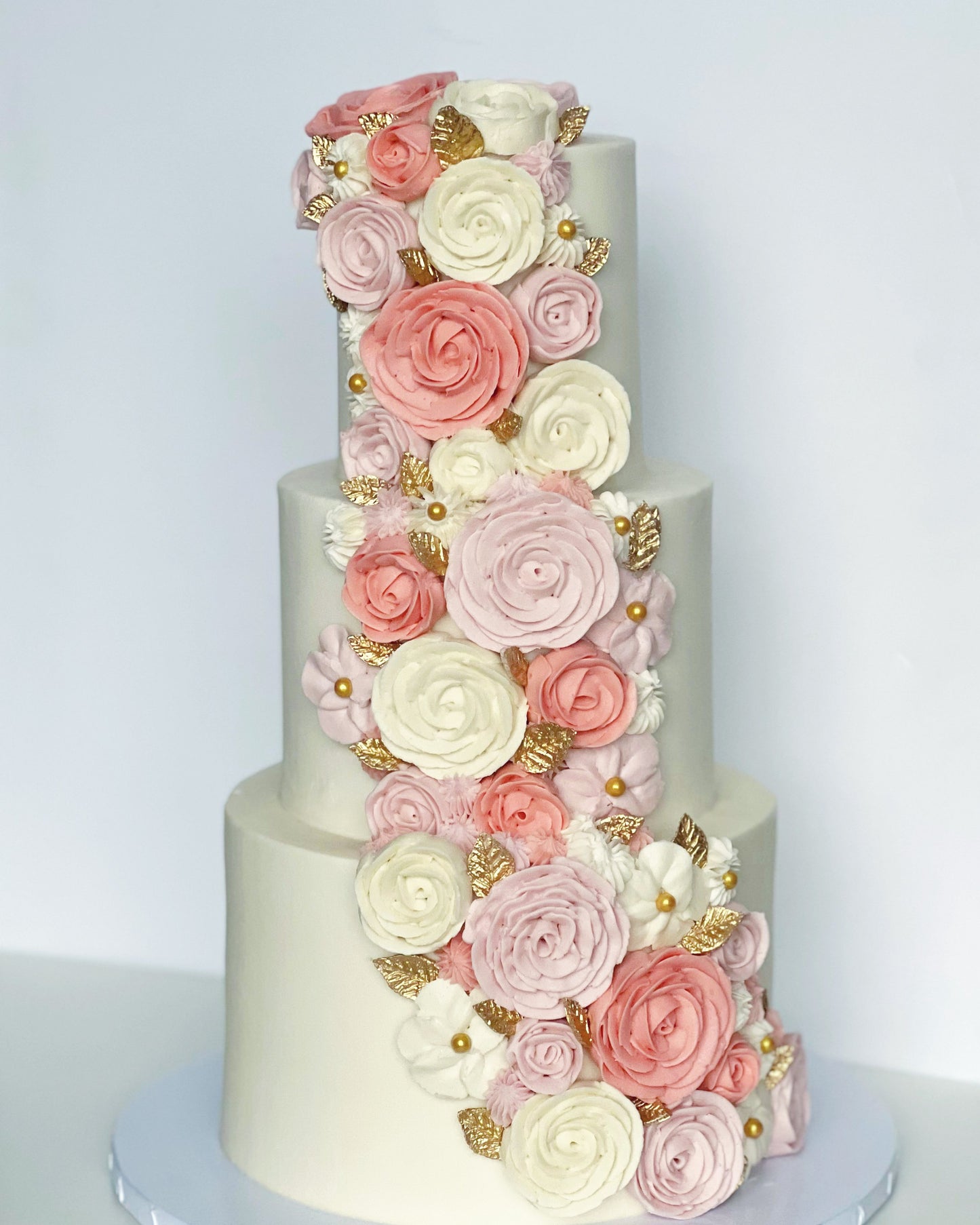 Cascading Buttercream Florals Cake
