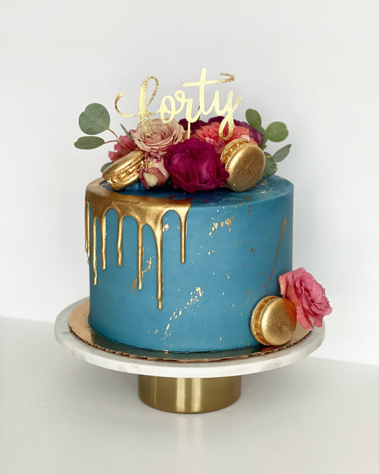 Gold Drip With Contrasting Fresh Florals and Macs Cake